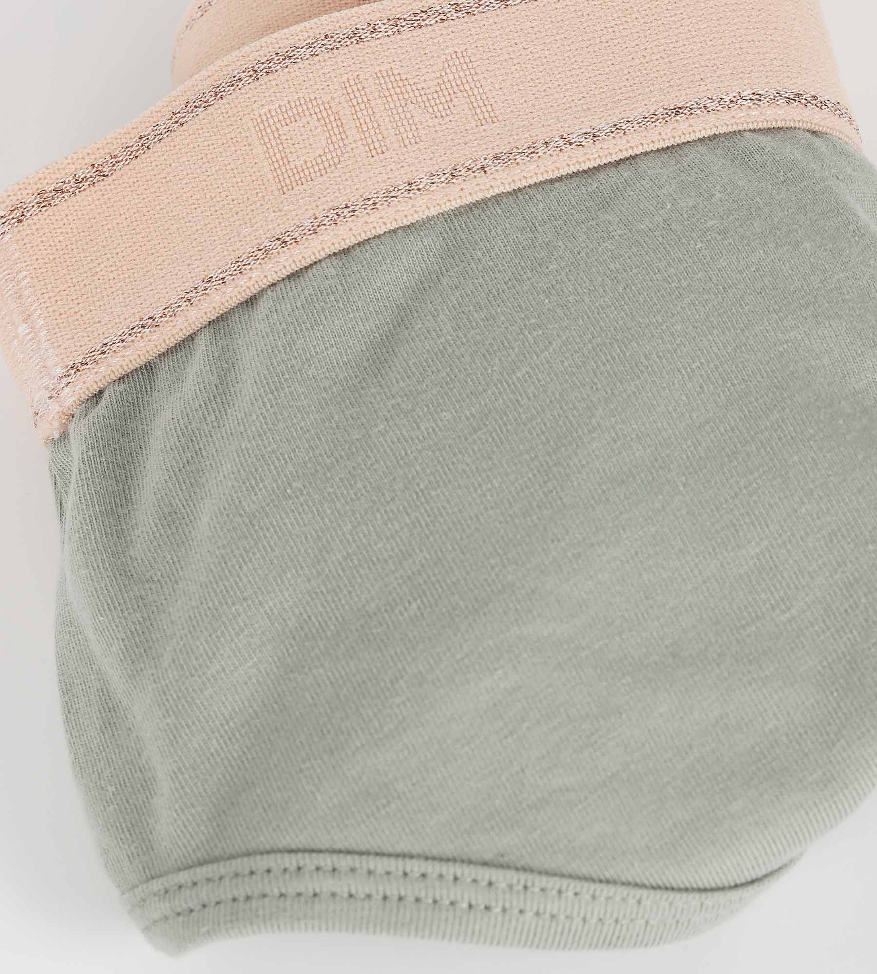 DIM Pantalón corto de niña en verde salvia y rosa Dim Sport