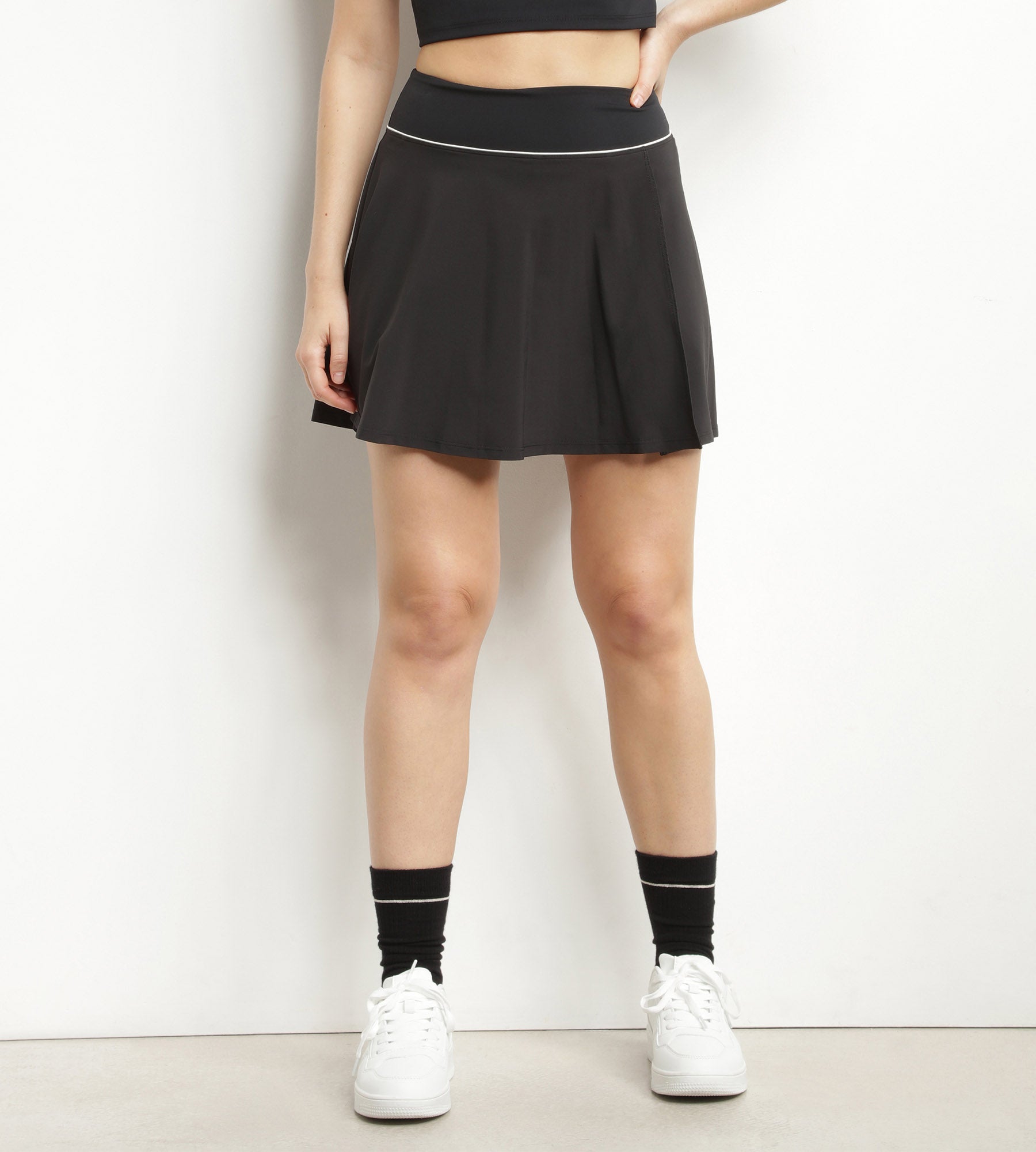 DIM Falda corta deportiva de mujer en microfibra negra Dim Move