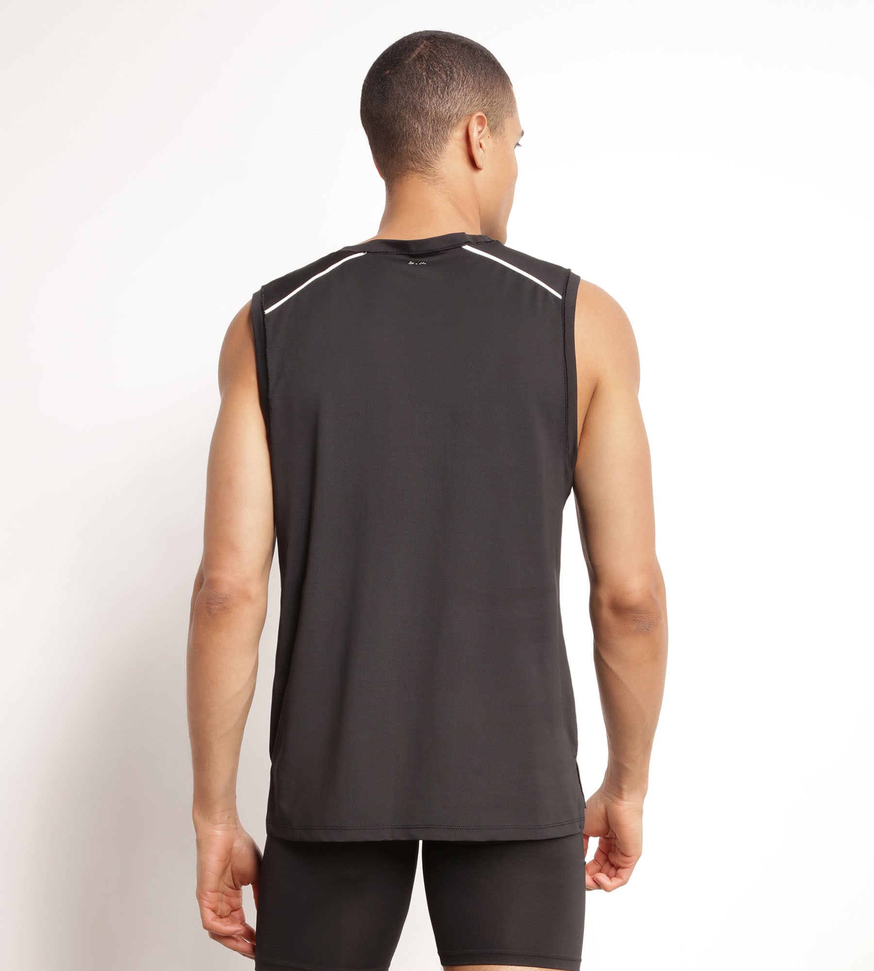 DIM Camiseta deportiva sin mangas para hombre en tejido vaporoso negro Dim Move