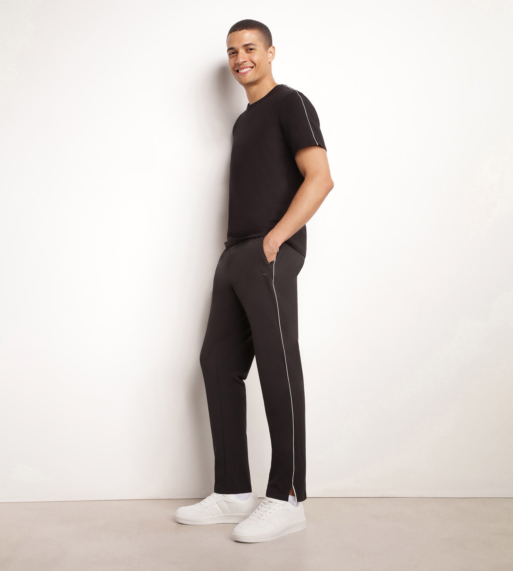 DIM Pantalón deportivo chino para hombre en punto elástico negro Dim Move