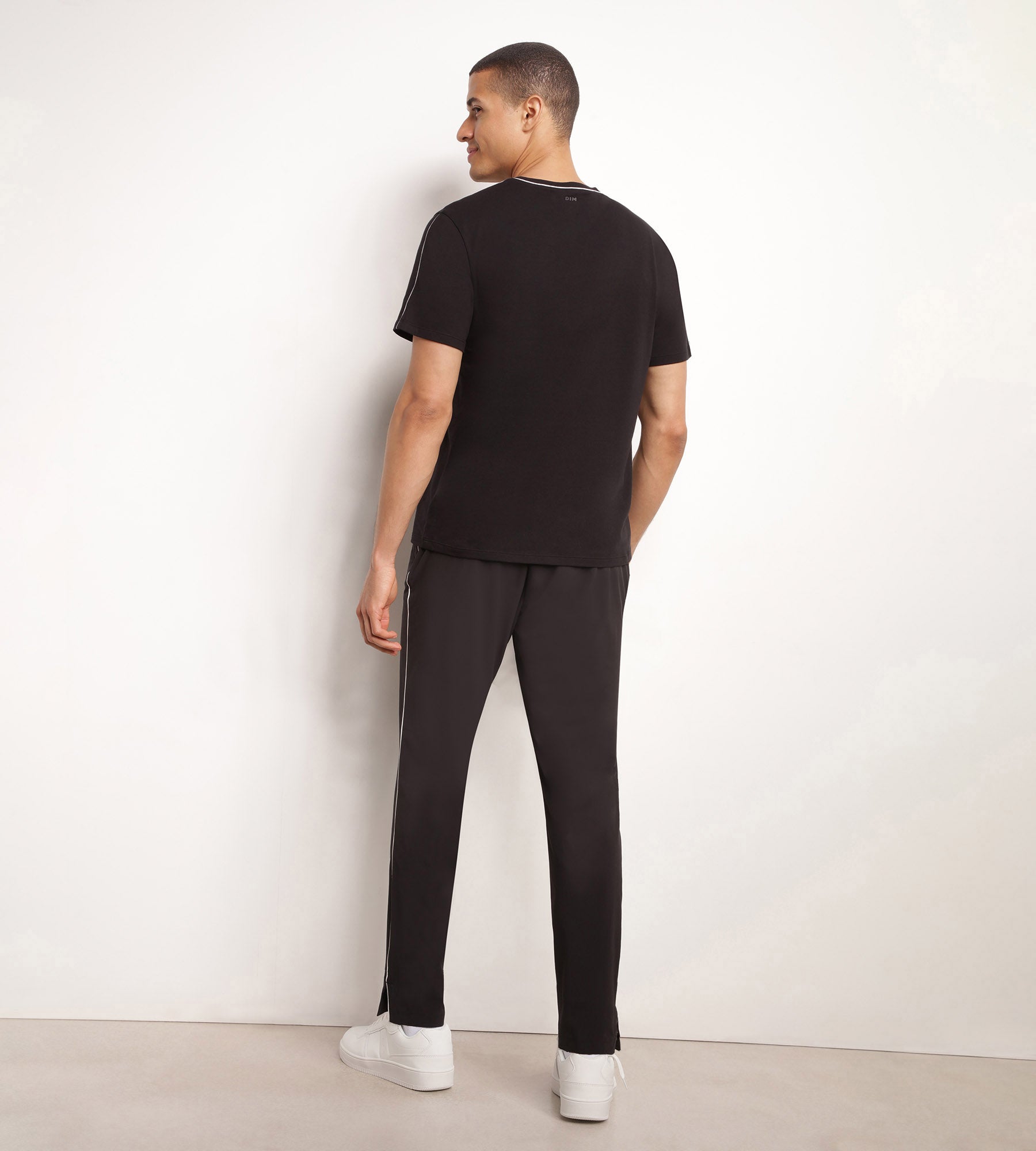 DIM Pantalón deportivo chino para hombre en punto elástico negro Dim Move