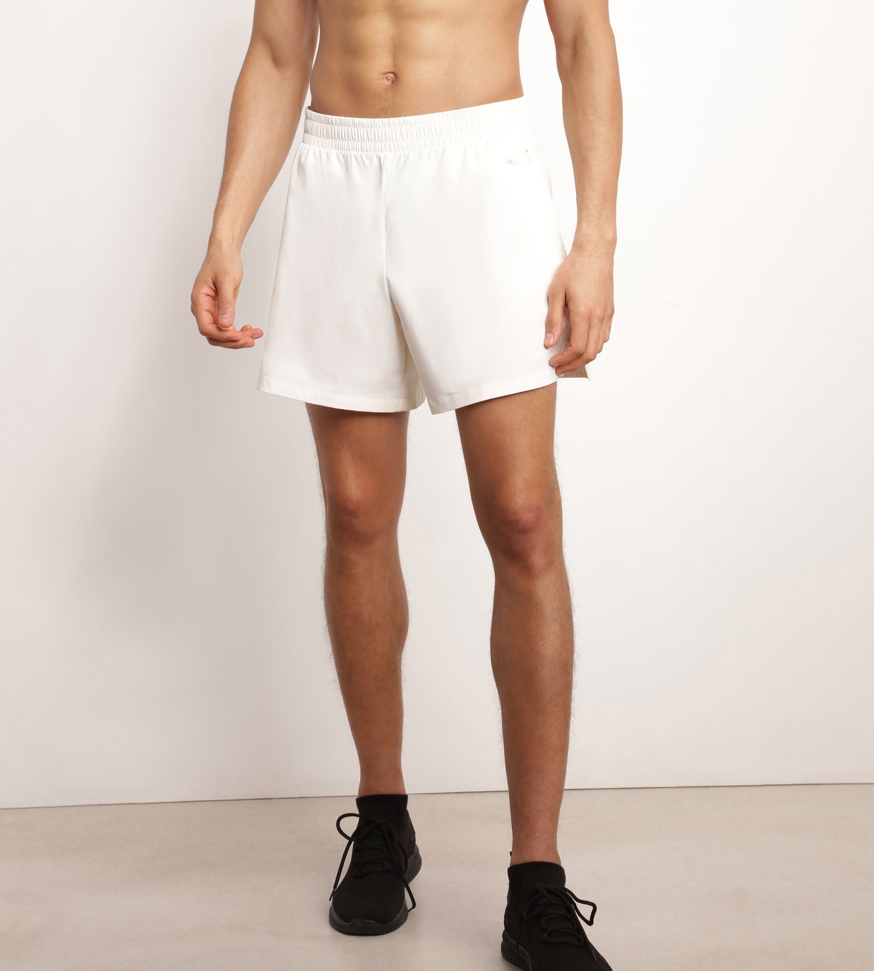 DIM Pantalón corto deportivo de hombre en tejido vaporoso crudo Dim Move