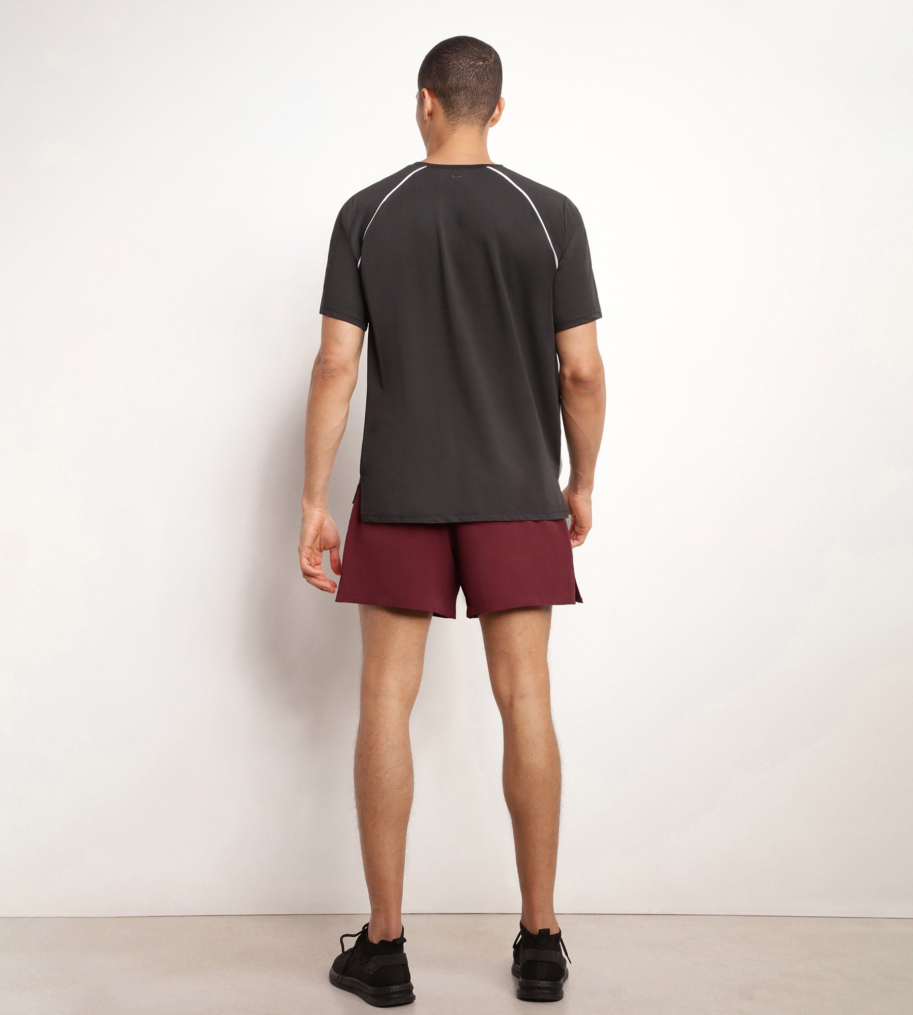 DIM Pantalón corto deportivo de hombre en tejido vaporoso burdeos Dim Move
