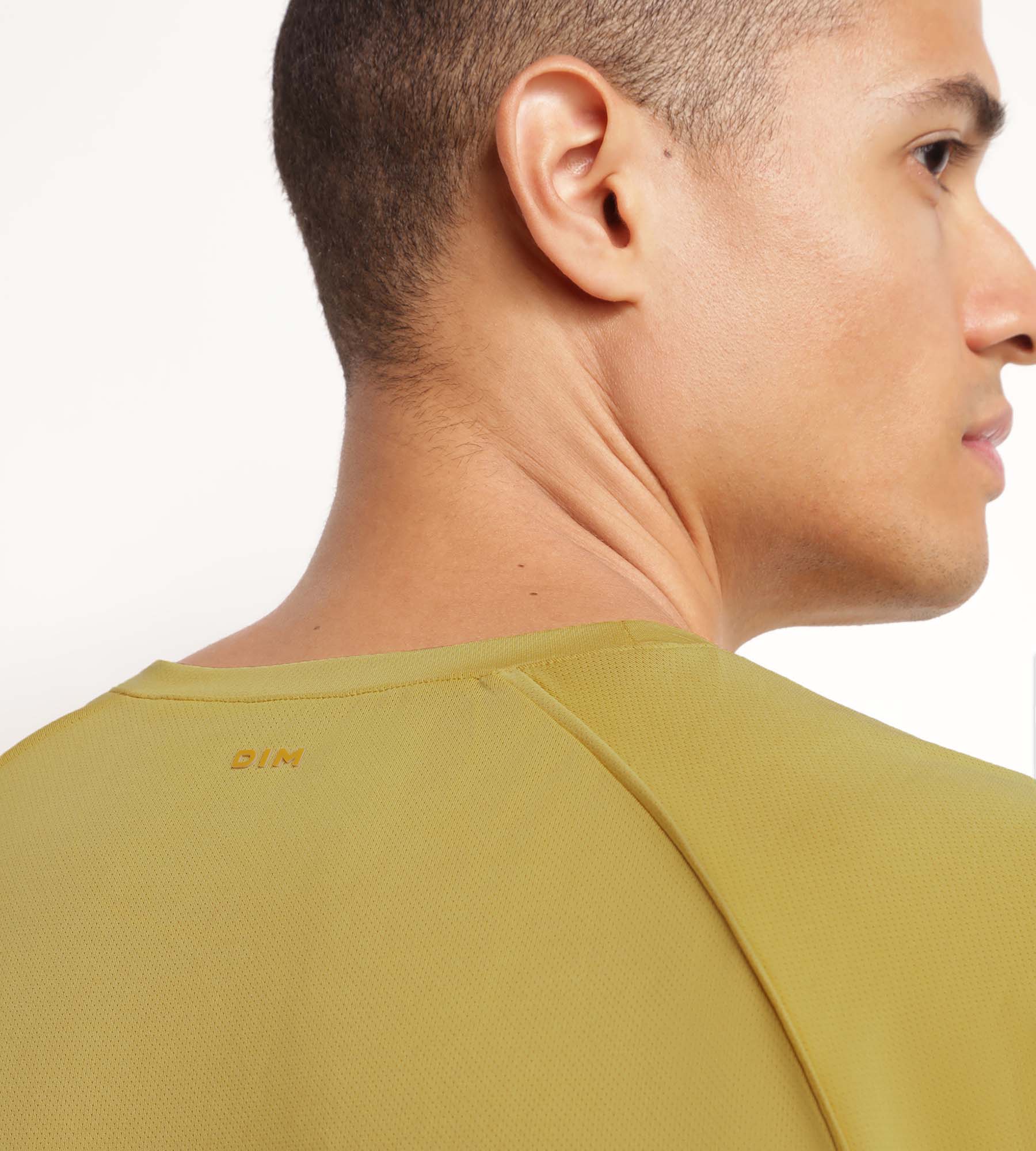 DIM Camiseta deportiva de hombre en tejido vaporoso oliva Dim Move