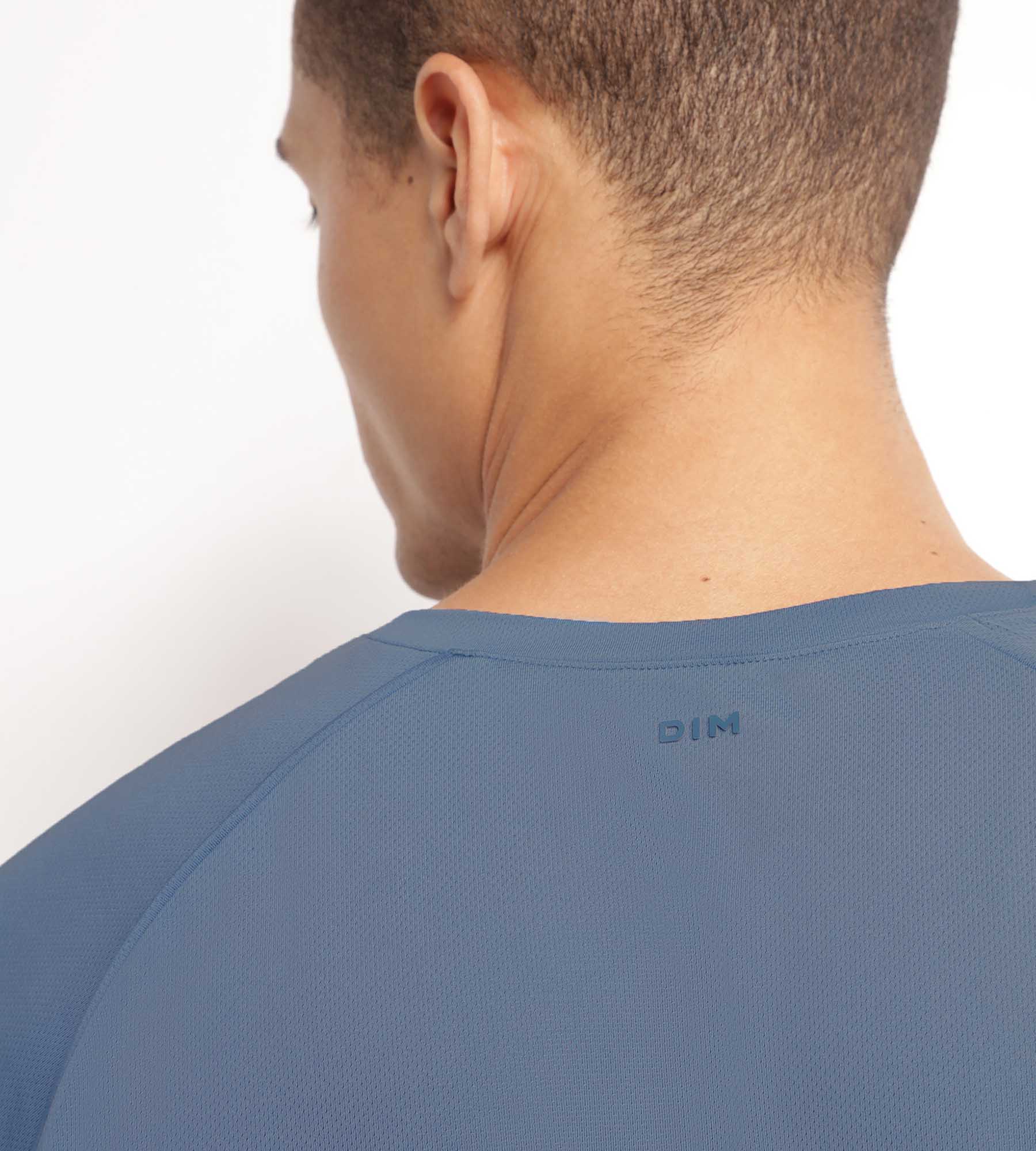 DIM Camiseta deportiva de hombre en tejido técnico azul Dim Move