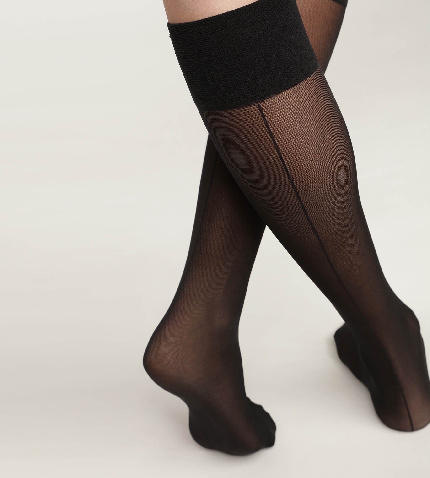 DIM medias de mujer en gasa transparente negro con línea de contraste Dim Style