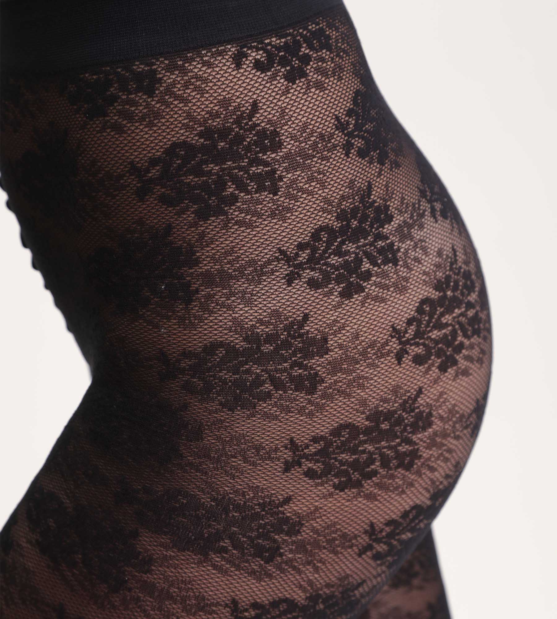 DIM Pantis negras con ramo de flores Dim Style