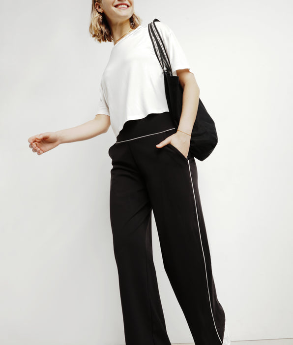 DIM Pantalón deportivo ancho de mujer en punto elástico negro Dim Move