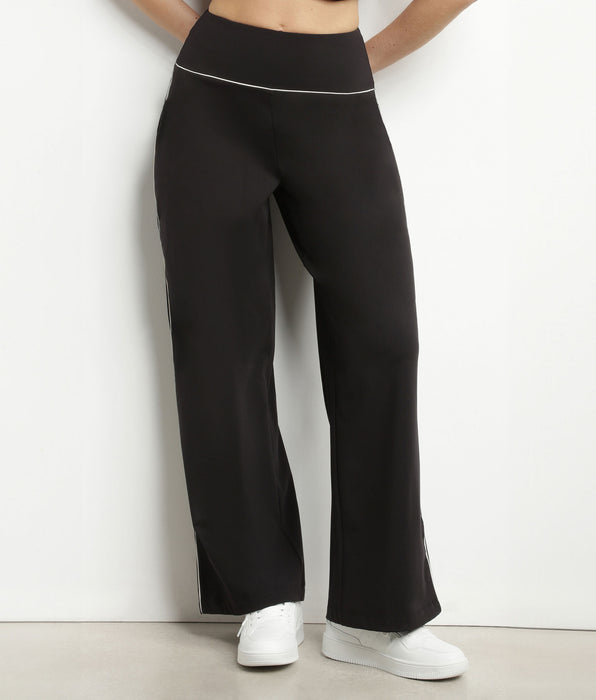 DIM Pantalón deportivo ancho de mujer en punto elástico negro Dim Move