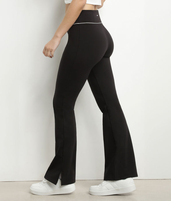 DIM Pantalón deportivo acampanado de mujer en punto elástico negro Dim Move