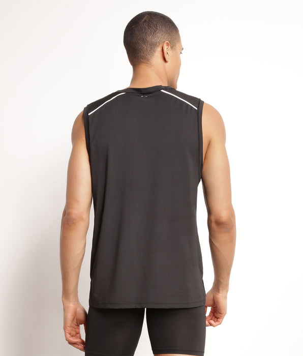 DIM Camiseta deportiva sin mangas para hombre en tejido vaporoso negro Dim Move