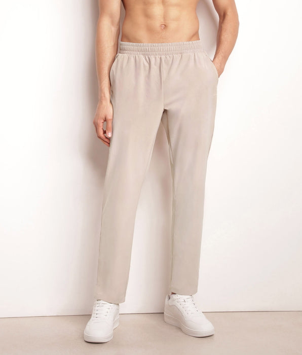 DIM Pantalón deportivo chino para hombre en punto elástico beis Dim Move