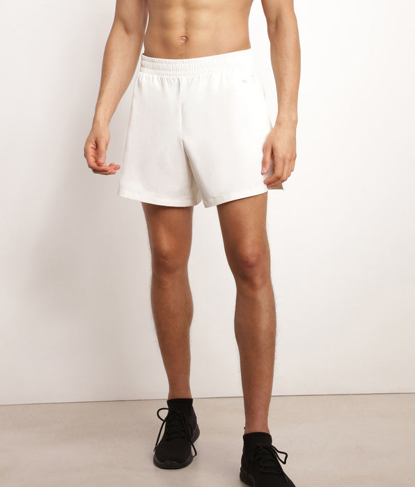 DIM Pantalón corto deportivo de hombre en tejido vaporoso crudo Dim Move