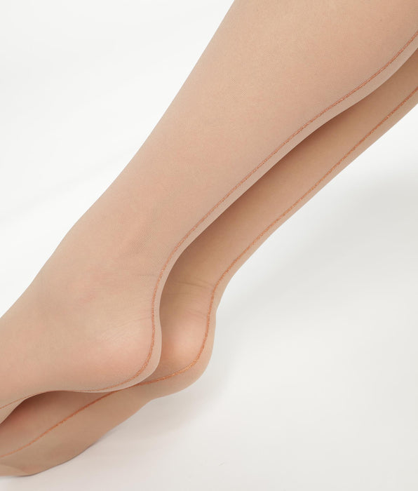 DIM Panti transparente beis con banda de lúrex dorado Dim Style