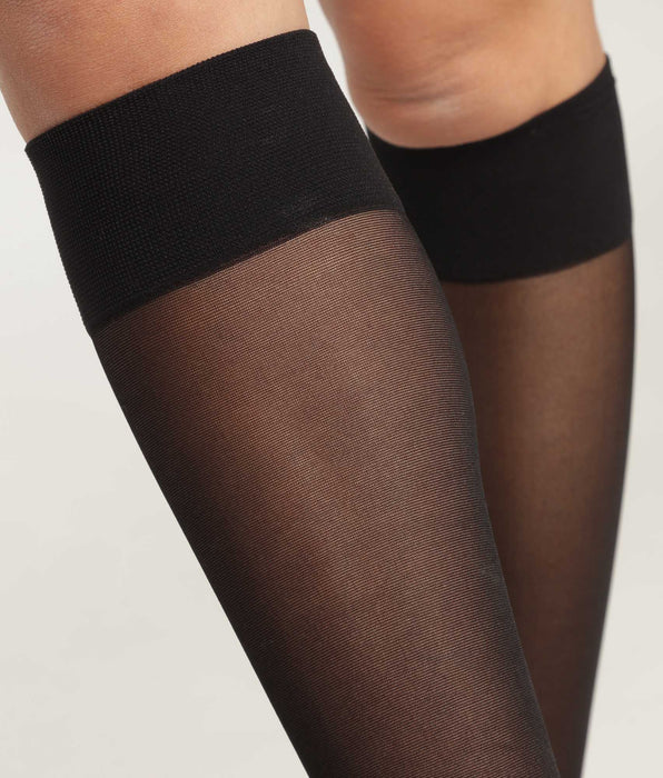 DIM medias de mujer en gasa transparente negro con línea de contraste Dim Style