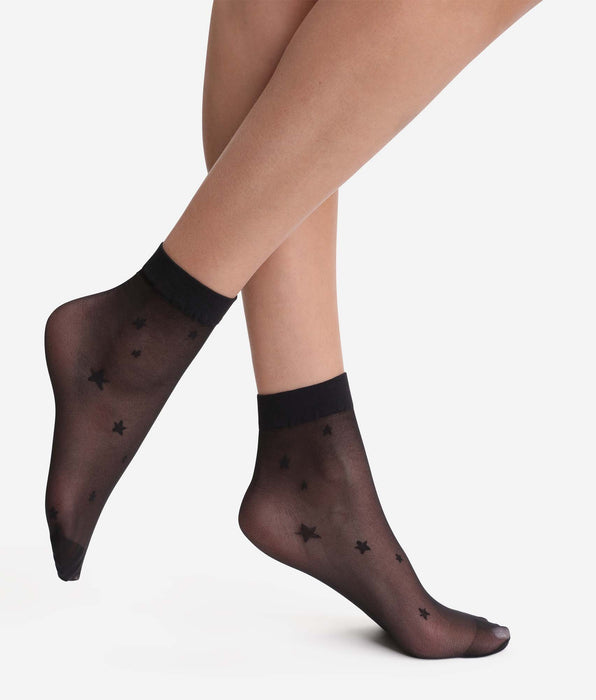 DIM Calcetines tobilleros negros transparentes con estrellas Dim Style