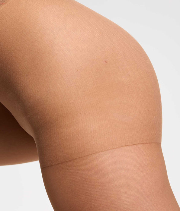 DIM Medias transparentes Nude marrón oscuro sin marca en la cintura