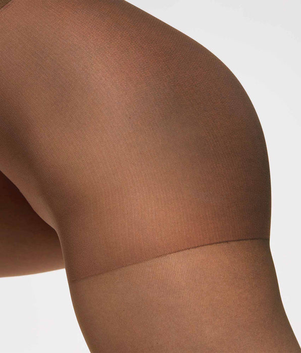 DIM Medias transparentes Nude marrón oscuro sin marca en la cintura