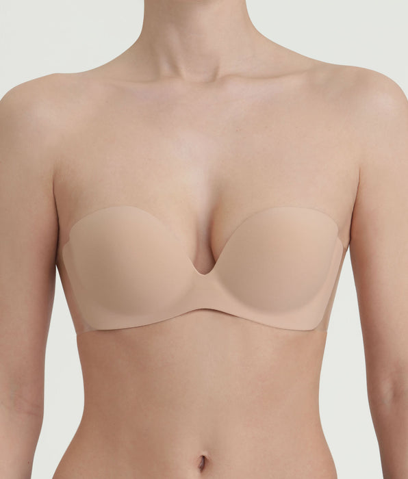 DIM Sujetador bandeau adhesivo sin tirantes nude